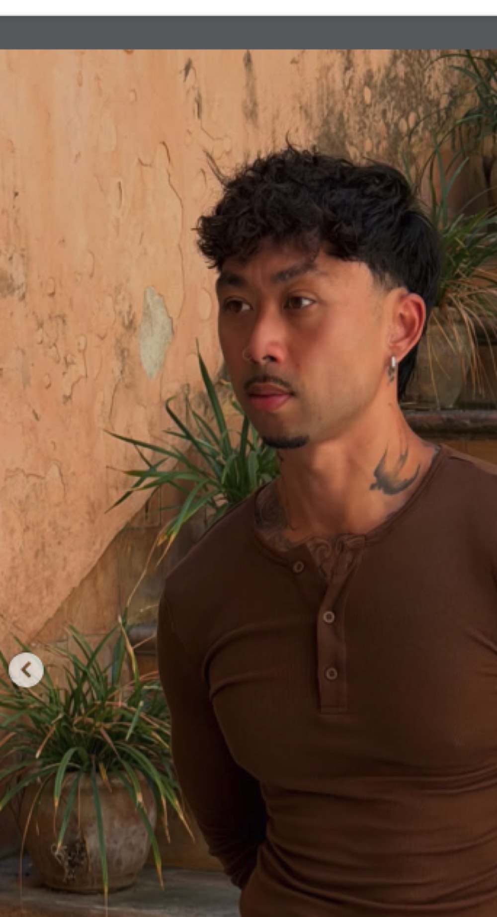 Junior Chea, founder of Last Seven Days, in the Espresso Henley